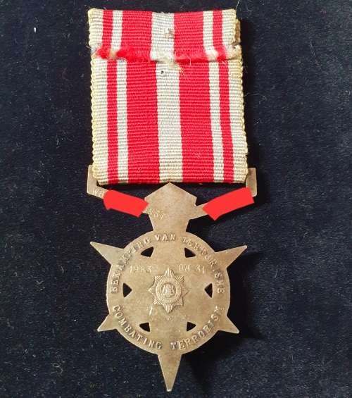 1983 KOEVOET BEKAMPING VAN TERRORISME FULL SIZE MEDAL. NUMBERED AND NAMED.