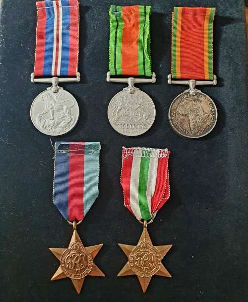 WW11 MEDAL GROUP. NAMED AND NUMBERED. INCL SILVER AFRIKADIENS MEDAL.