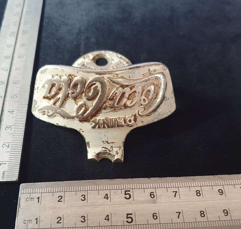 VINTAGE COCA COLA CAST IRON UNDER COUNTER BOTTLE OPENER. STARR X PATENT