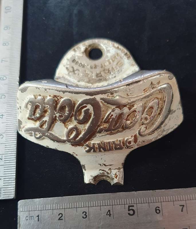 VINTAGE COCA COLA CAST IRON UNDER COUNTER BOTTLE OPENER. STARR X PATENT