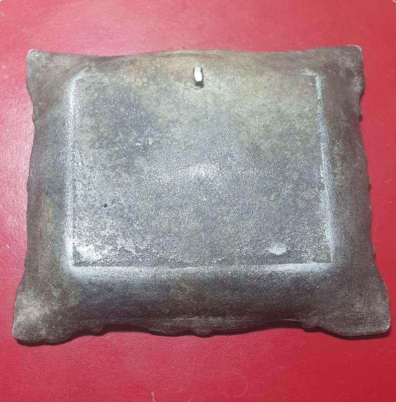 Antique cast iron framed flowers wall plate.