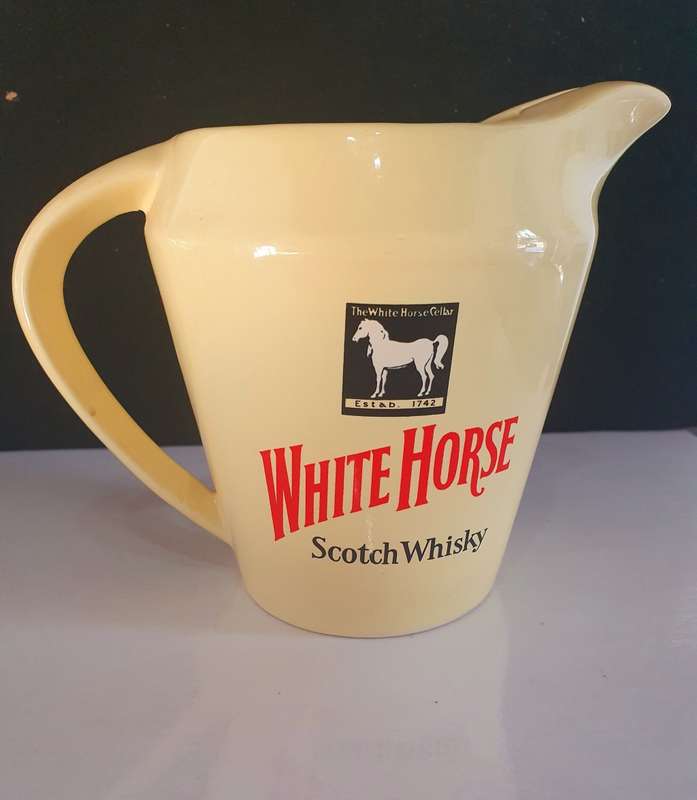 VINTAGE WHITE HORSE WHISKY JUG. WADE ENGLAND.