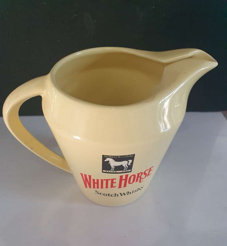 VINTAGE WHITE HORSE WHISKY JUG. WADE ENGLAND.