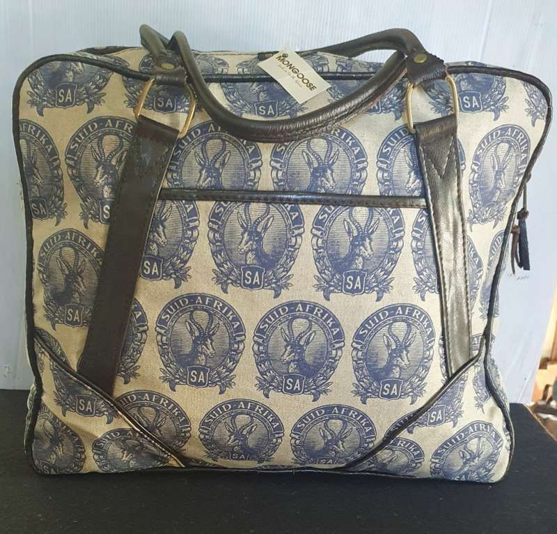 MONGOOSE HANDCRAFTED WEEKEND BAG WITH OLD SA STAMP LOGO.  UNUSED.