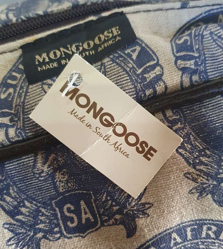 MONGOOSE HANDCRAFTED WEEKEND BAG WITH OLD SA STAMP LOGO.  UNUSED.