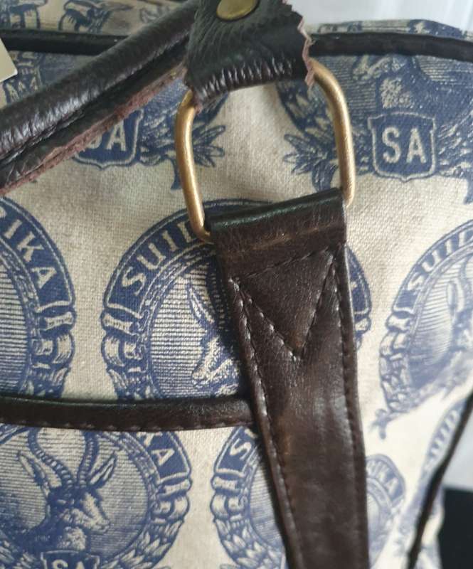 MONGOOSE HANDCRAFTED WEEKEND BAG WITH OLD SA STAMP LOGO.  UNUSED.