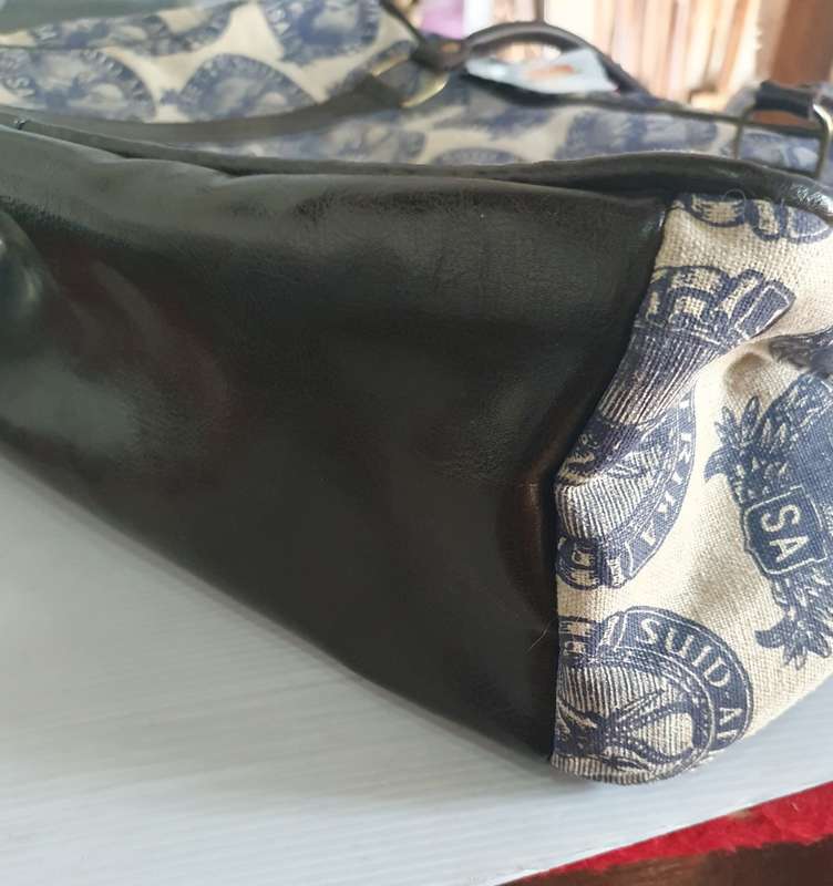 MONGOOSE HANDCRAFTED WEEKEND BAG WITH OLD SA STAMP LOGO.  UNUSED.