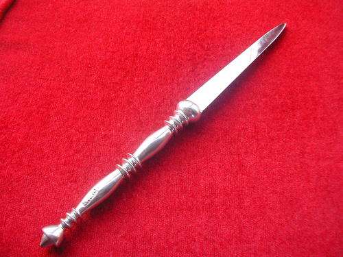 LETTER OPENER. SILVER PLATED WITH STAINLESS BLADE.