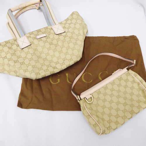 Pair of authentic Gucci handbags (Made in Italy) with original material bag for protection