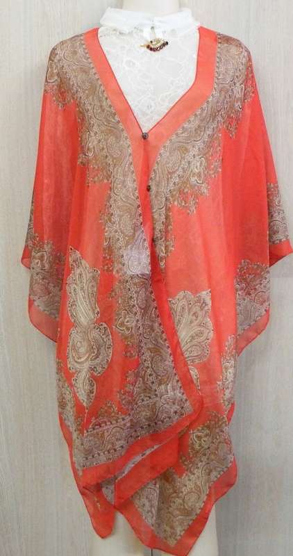 Beautiful sleeveless top 100% Polyester (Top underneath and badge not included)