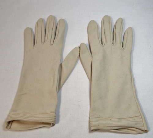 Pair of vintage women`s beige gloves
