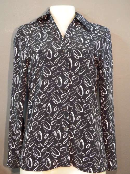Ladies corporate ware long sleeve shirt with shoulder pads - Size 30 - 100 polyester