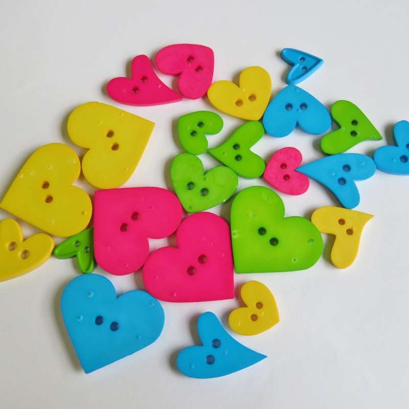 Lot of 21 different colour heart shape buttons