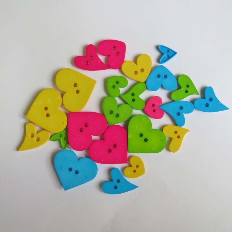 Lot of 21 different colour heart shape buttons