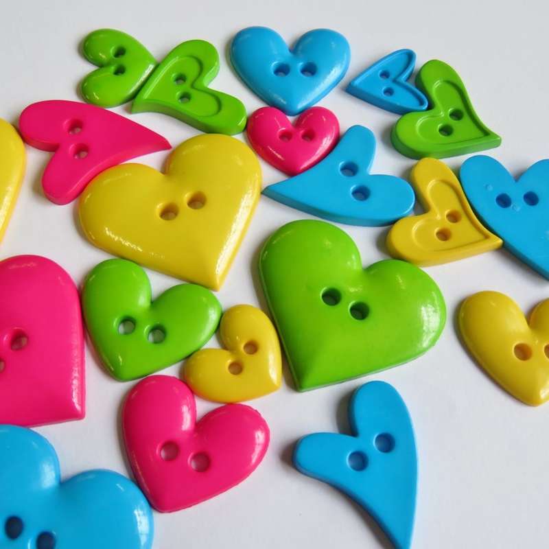 Lot of 21 different colour heart shape buttons
