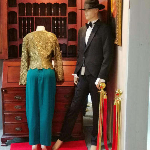 Leonard Joubert Couturiet emerald green evening dresswith gold lace