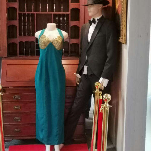 Leonard Joubert Couturiet emerald green evening dresswith gold lace