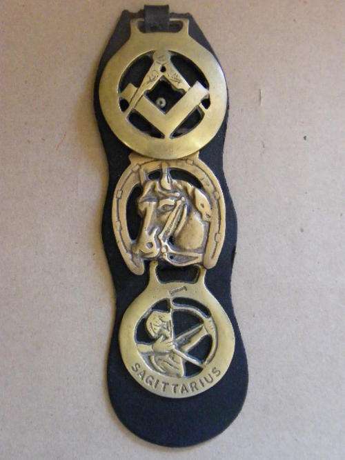 Lot of 3 horse brasses on strap - one is masonic!