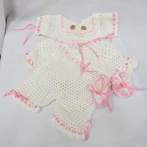 Brand new hand knit white baby dress, pants and shoes with pink ribbons