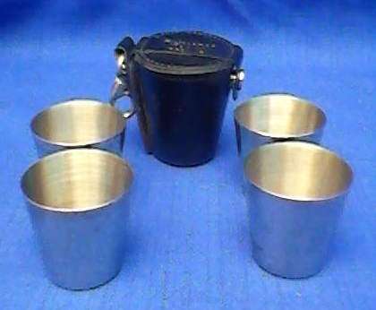 SET OF FOUR TIN SHOT GLASSES IN POUCH
