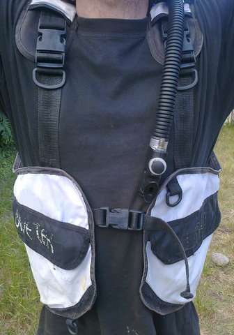 DIVETEK DIVING JACKET WITH A STRAP TO KEEP AIRTANK ON THE BACK VERY WELL USED