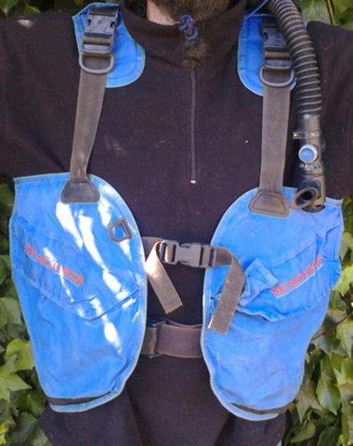 SEAQUEST DIVING JACKET WITH STRAP TO KEEP THE TANK ON VERY WELL USED