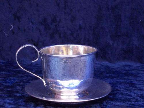 TEA CUP AND SAUCER