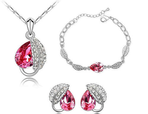 necklace, earring and bracelet triumvirate in princess-worthy pink