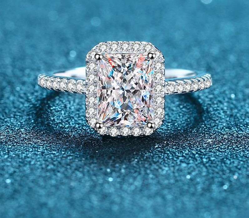 1ct 7x5mm D VVS1 Radiant Cut Moissanite Halo Ring | 18K White Gold Over 925 Sterling Silver