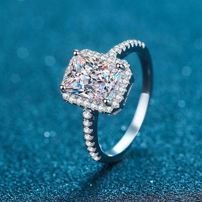1ct 7x5mm D VVS1 Radiant Cut Moissanite Halo Ring | 18K White Gold Over 925 Sterling Silver