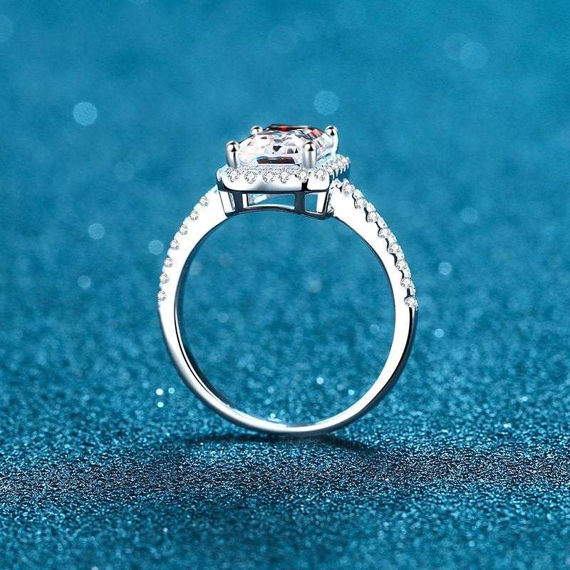 1ct 7x5mm D VVS1 Radiant Cut Moissanite Halo Ring | 18K White Gold Over 925 Sterling Silver