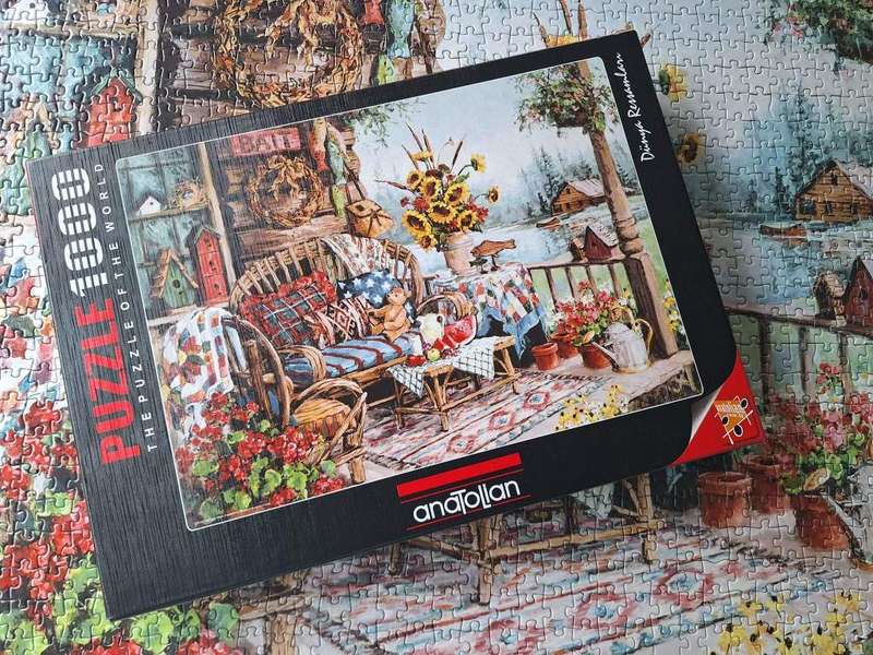 Anatolian 1000 Piece Puzzle: Country Hideaway Porch Lake Teddy Bear Flowers