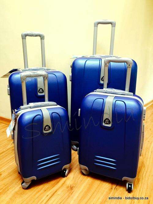 Set of 4 Suitcases Travel Trolley Luggage, ABS with Universal Wheels - Travel in Style - BLUE New