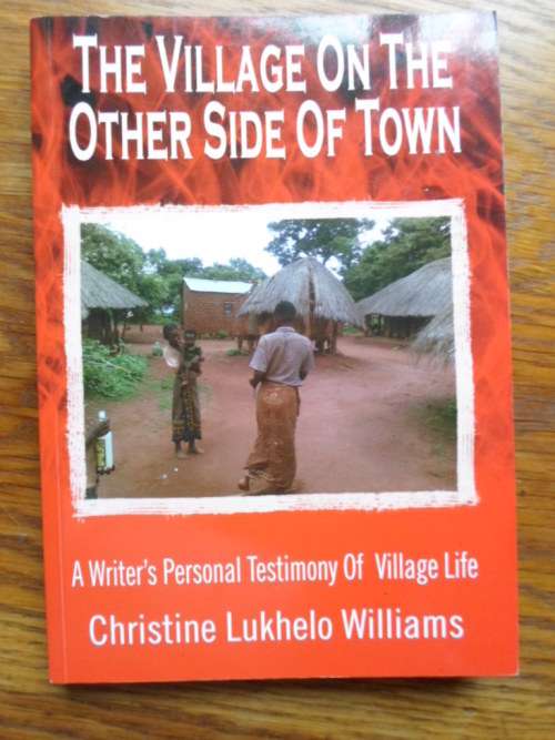 Signed copy. THE VILLAGE ON THE OTHER SIDE OF TOWN. By Christine Lukhelo Williams, Zambia