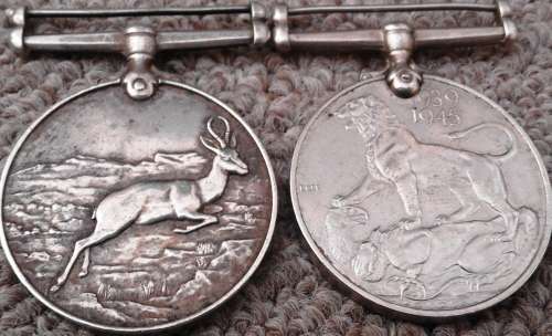Mixed coins, medals and notes