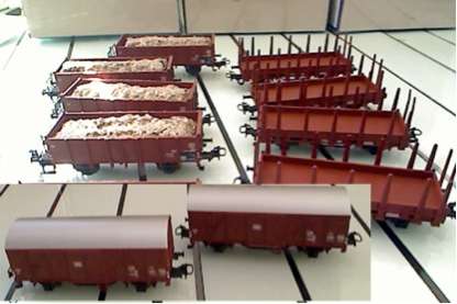 Marklin HO stake cars (2), covered cars (3) and gondolas with loads (5)