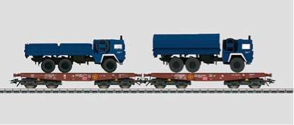 Marklin HO 48718 - 2 heavy duty flat cars with truck loads - all diecast!!