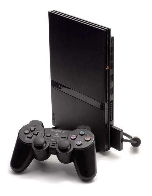 Slimline PS2 Console plus Vibration feedback Steering and games