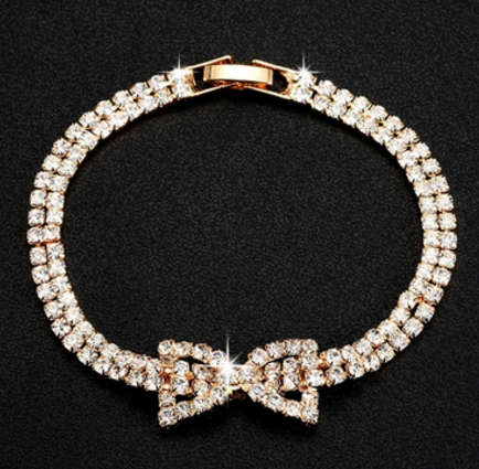 ***SIMULATED DIAMOND BOW BRACELET ~ YELLOW GOLD PLATED ~***