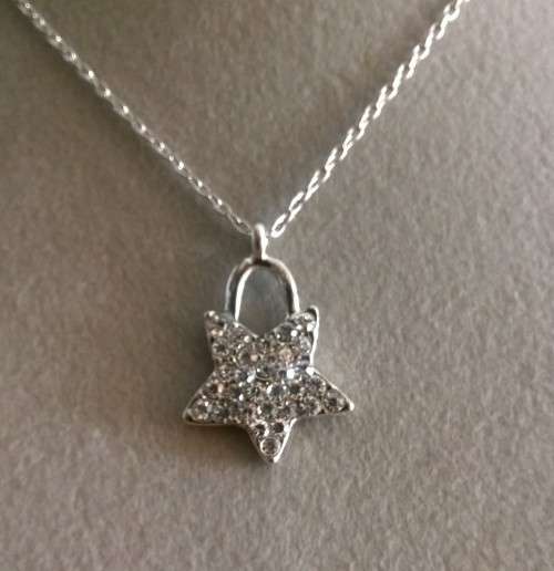 ***SILVER STAR SHAPED PENDANT***
