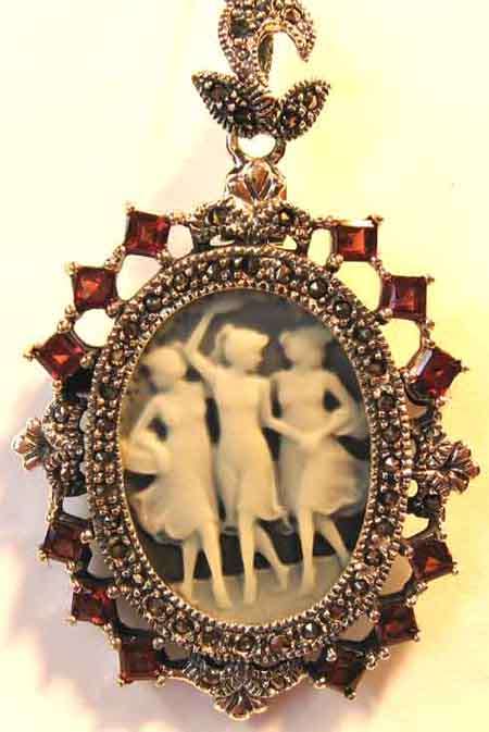 Beautiful Sterling Silver, Marcasite and Garnets " Cameo " Brooch and Pendant .