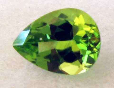 Excellent 10.00 x 8.00 mm Pear faceted cut Peridot  2.57 ct.