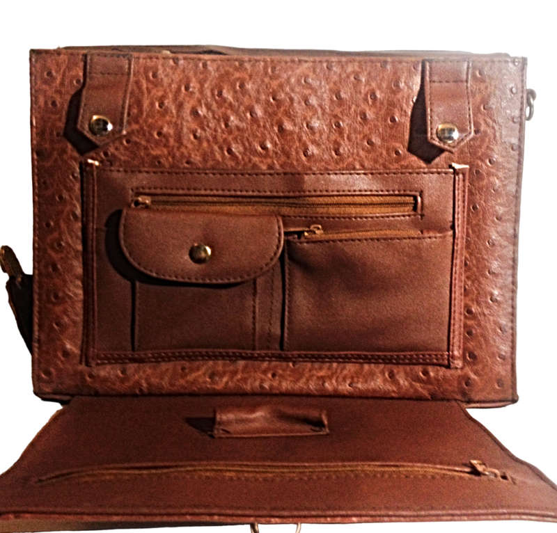 Elevate your accessory game with this exquisite brown leather vintage treasure