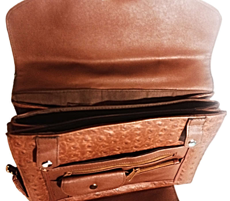 Elevate your accessory game with this exquisite brown leather vintage treasure