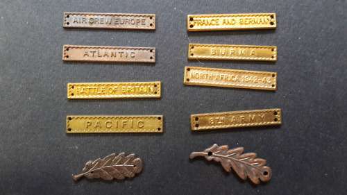Collection of WWII medal clasps - sold as is