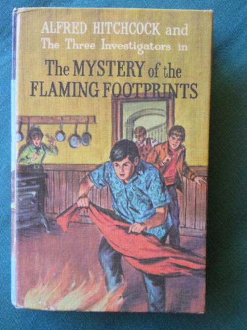 Alfred Hitchock and The Three Investigators in The MYSTERY of the FLAMING FOOTPRINTS