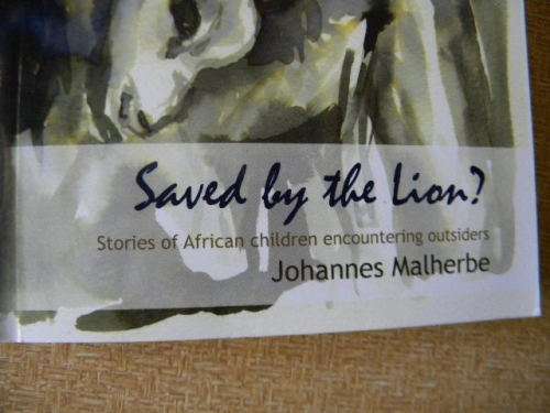 SAVED BY THE LION  Stories of African children encountering outsiders  by Johannes Malherbe (SIGNED)