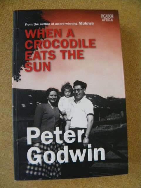 WHEN A CROCODILE EATS THE SUN by Peter Godwin