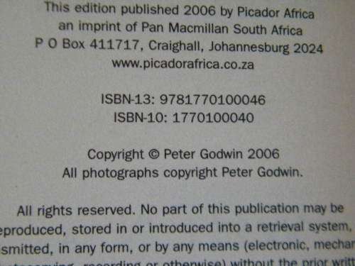 WHEN A CROCODILE EATS THE SUN by Peter Godwin