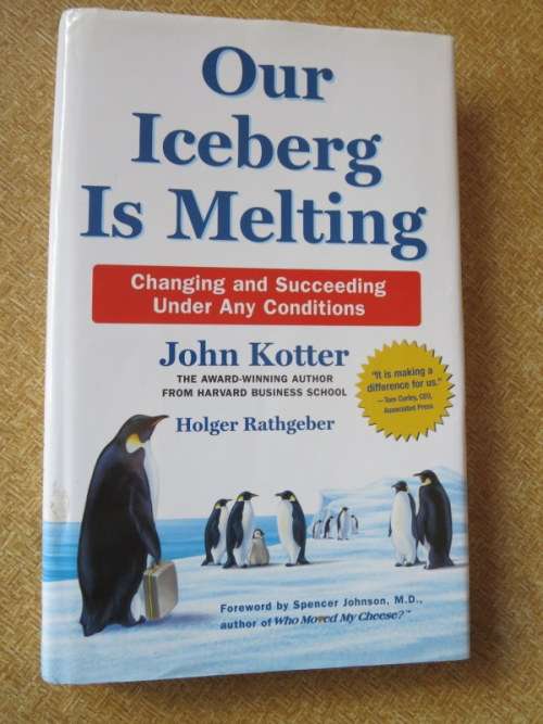 OUR ICEBERG IS MELTING  by John Kotter and Holger Rathgeber  Artwork: Peter Mueller